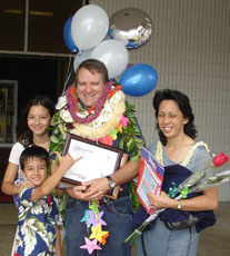 Photo of teacher Dale Olive with his family.
