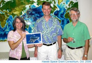 Photo of Linda Martel, Astronaut Stan Love, and Ed Scott in Honolulu.