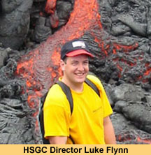 Photo of Dr. Luke Flynn in front of an active lava flow.
